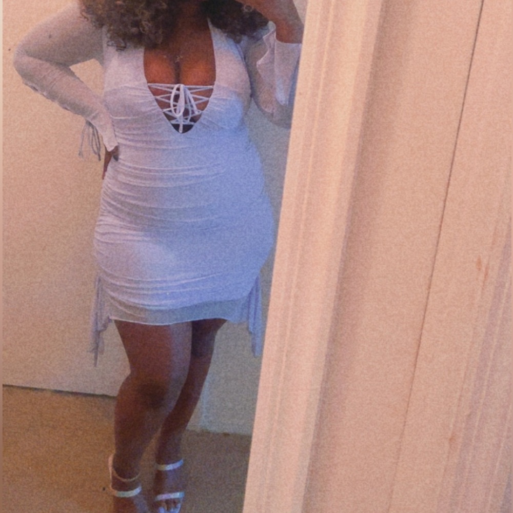 Bodycon, ruched,long sleeved lilac mini dress.                         Worn once